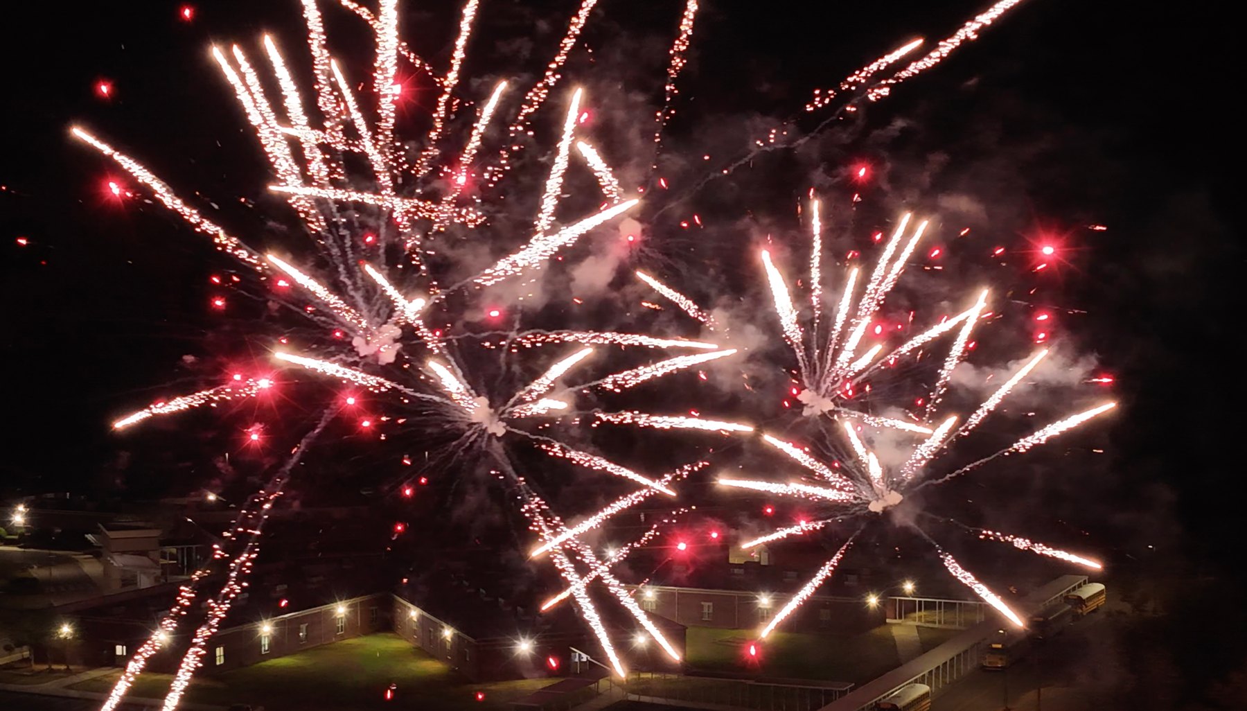 Fireworks over the school after dark, seen from above